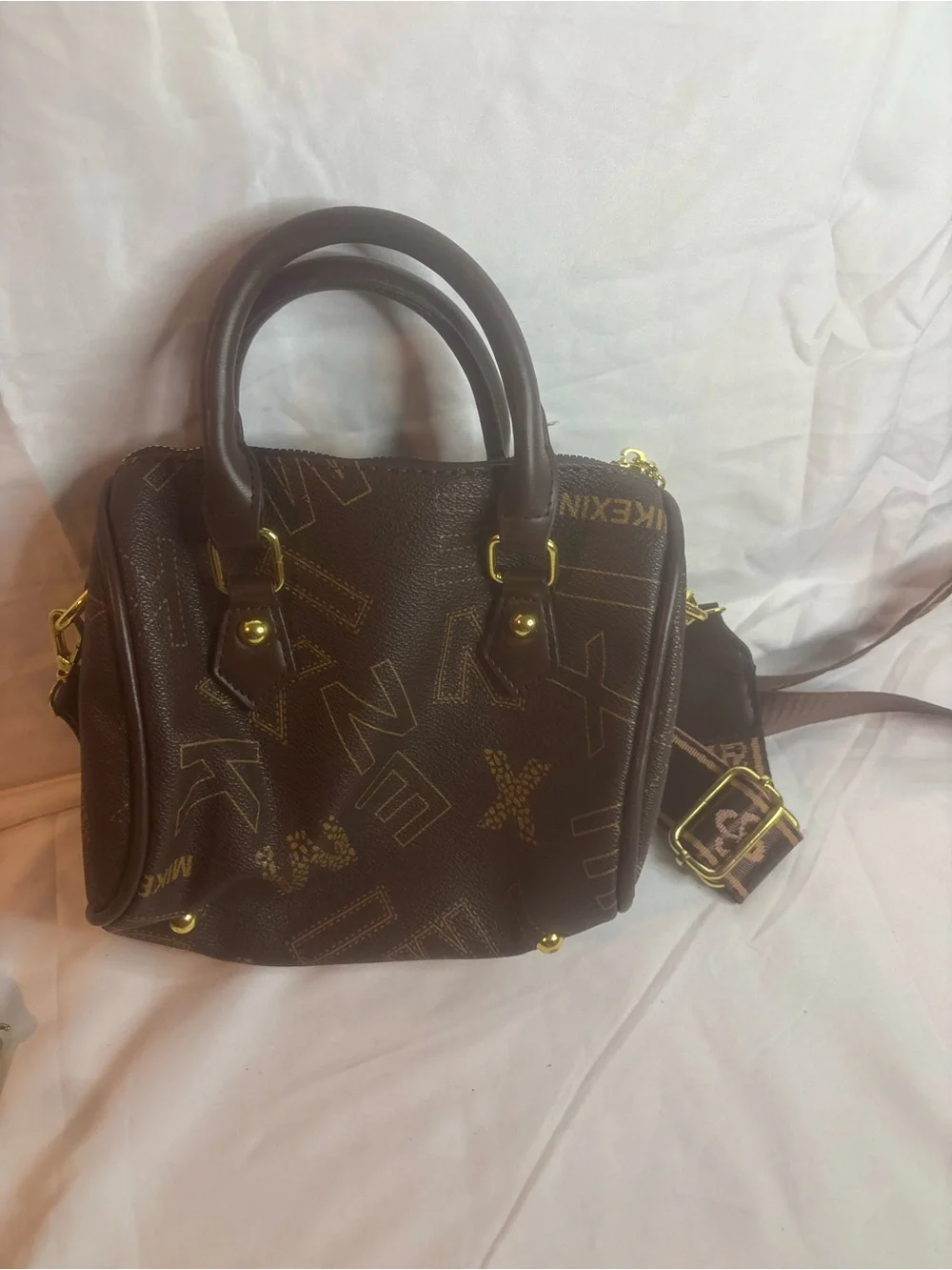 Luxury-Inspired Brown Pattern Satchel with Gold Accents